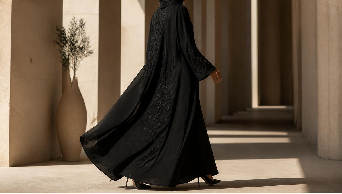 Editorial statement abaya with dramatic silhouette
