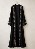 Black open-front abaya with vertical pink floral embroidery